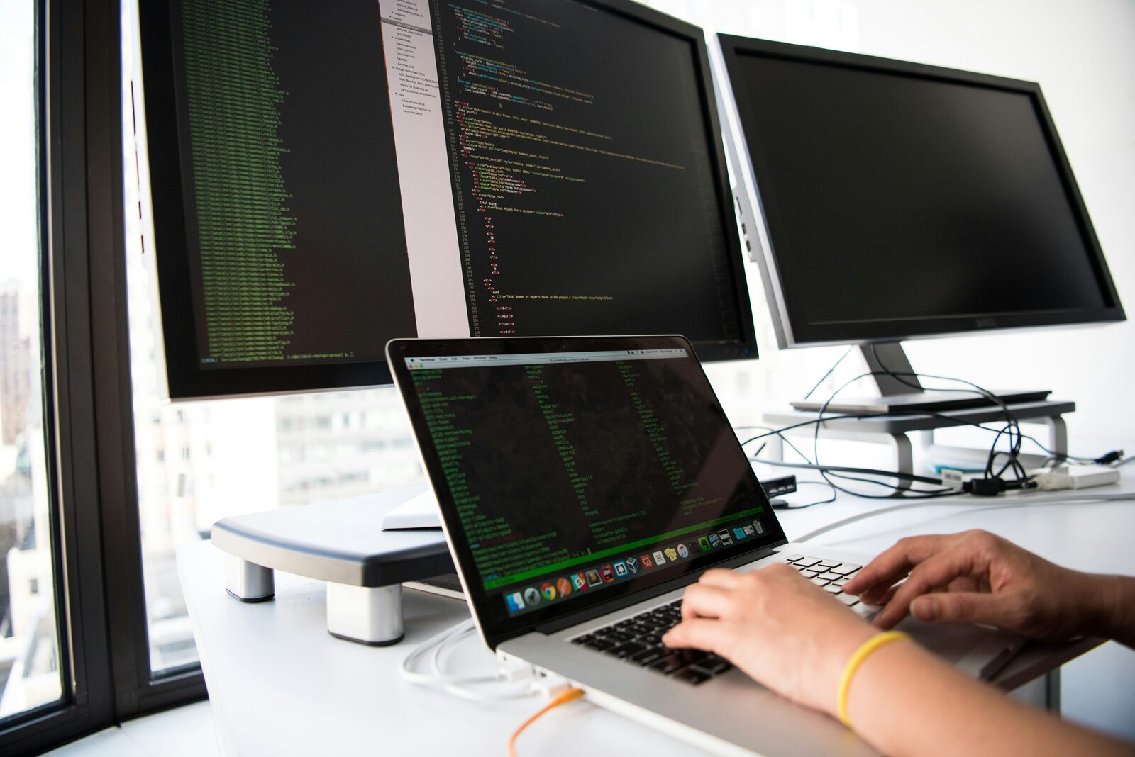 person using computer on table
